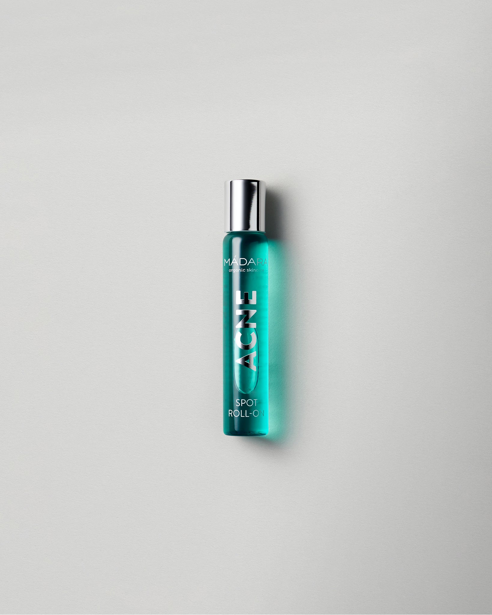 MÁDARA Organic Skincare acne spot roll on A2103 product photo on plain background.