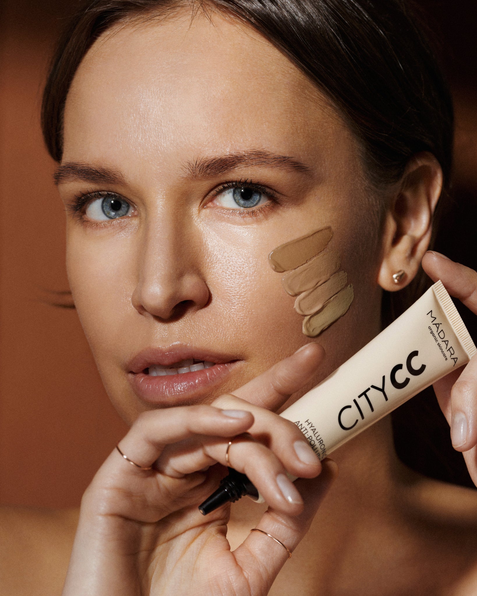 MÁDARA Organic Skincare spf 15 tinted cc cream medium A3412 mineral sunscreen product photo on plain background.