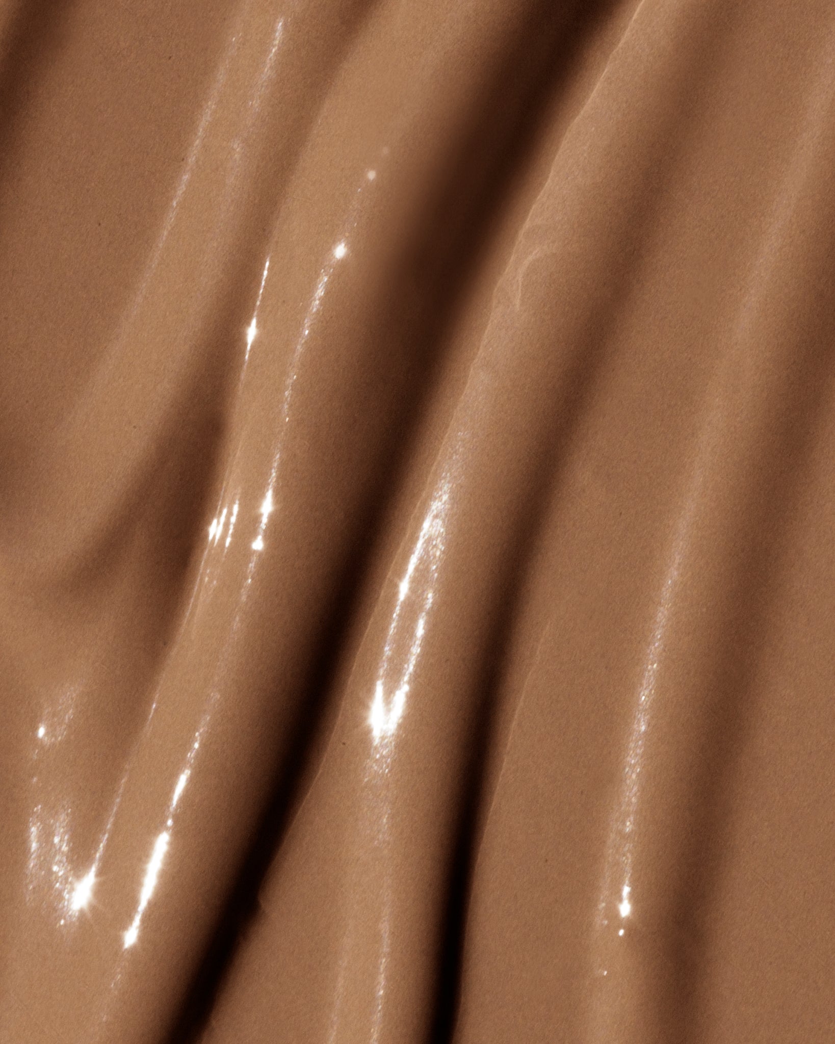 Texture close-up of MÁDARA Organic Skincare the concealer amber A6115 concealer �swatch demonstrates consistency and finish.