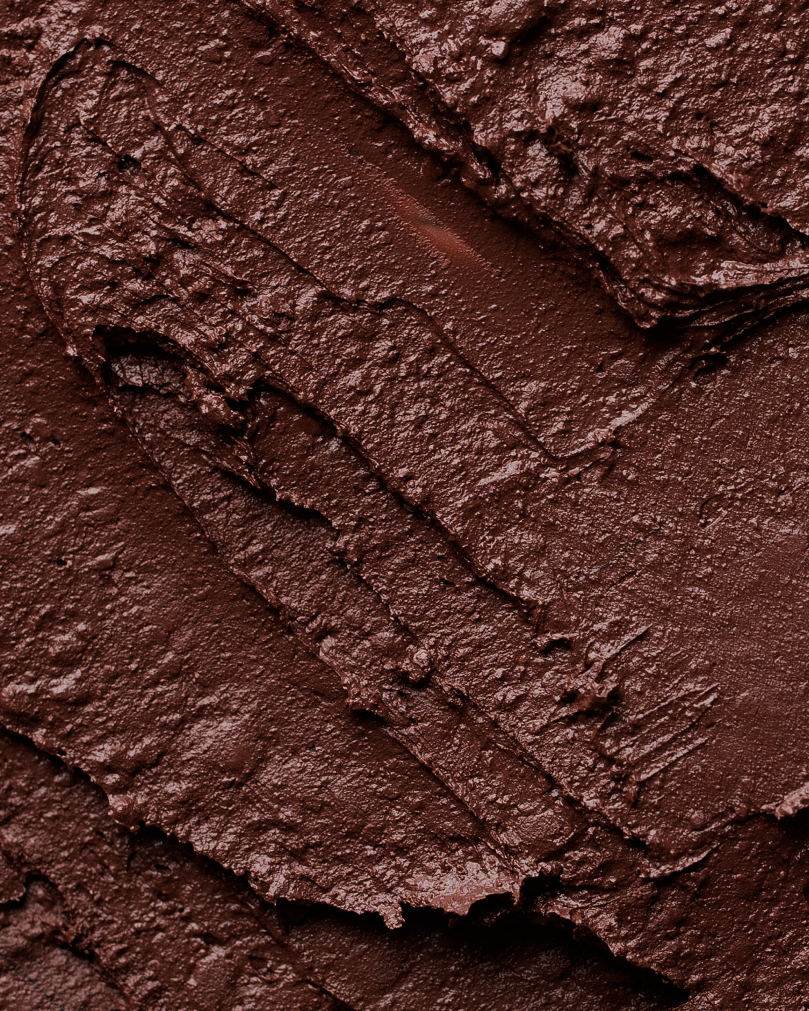 Texture close-up of MÁDARA Organic Skincare satin shine lipstick dominance A6504 �swatch demonstrates consistency and finish.