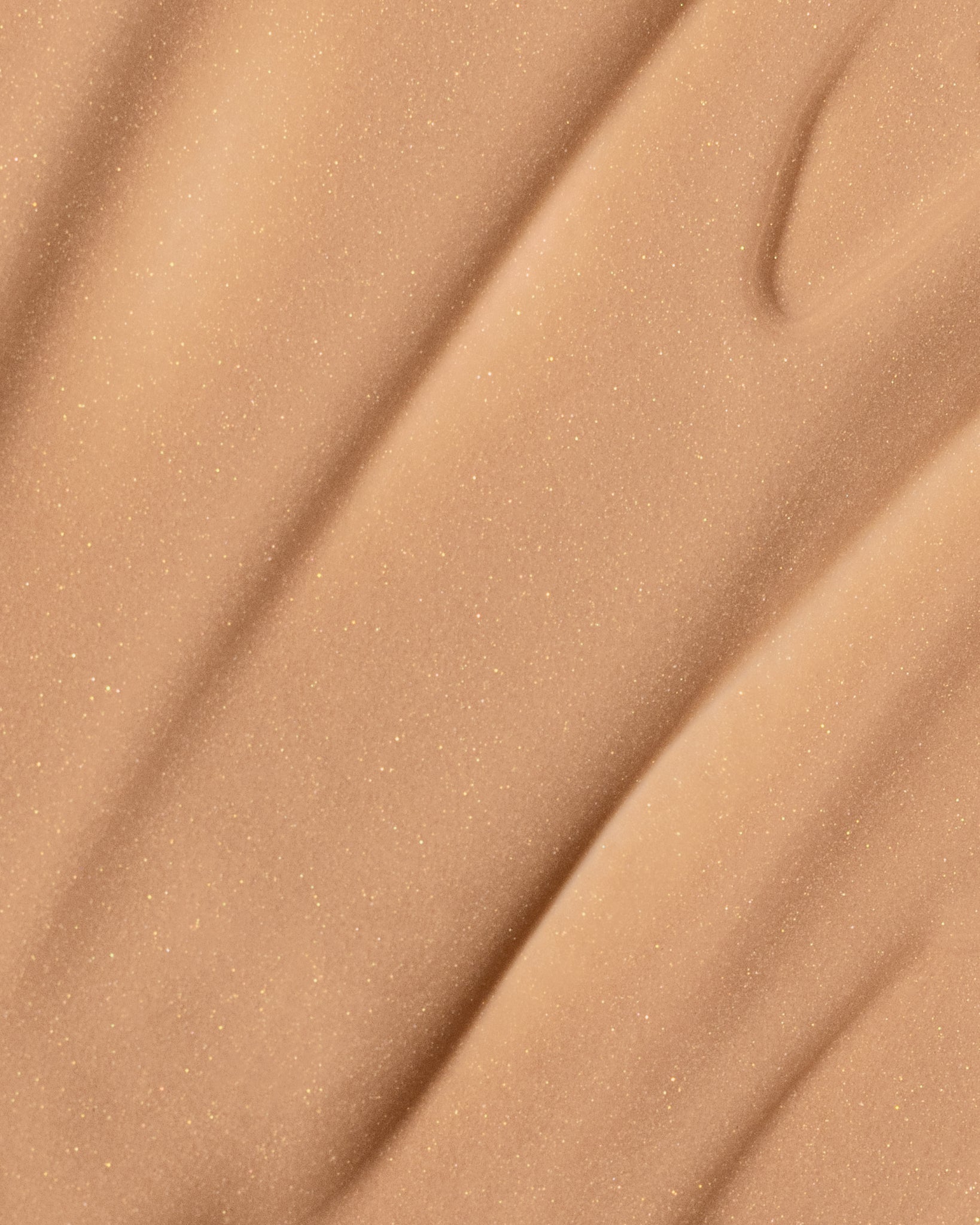 Texture close-up of MÁDARA Organic Skincare sun flower A3513 �swatch demonstrates consistency and finish.
