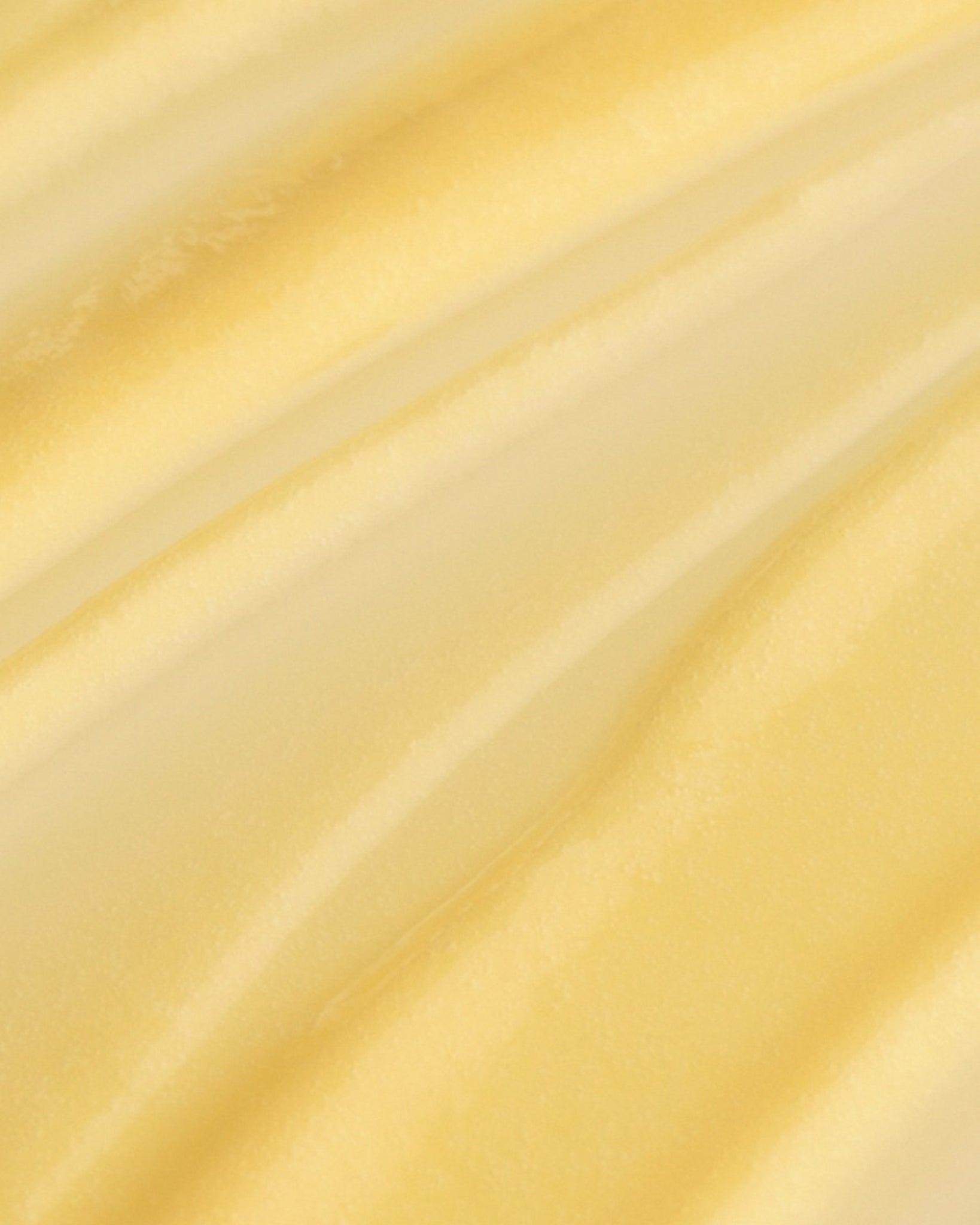 Texture close-up of MÁDARA Organic Skincare vitamin c concentrate A3301 �swatch demonstrates consistency and finish.