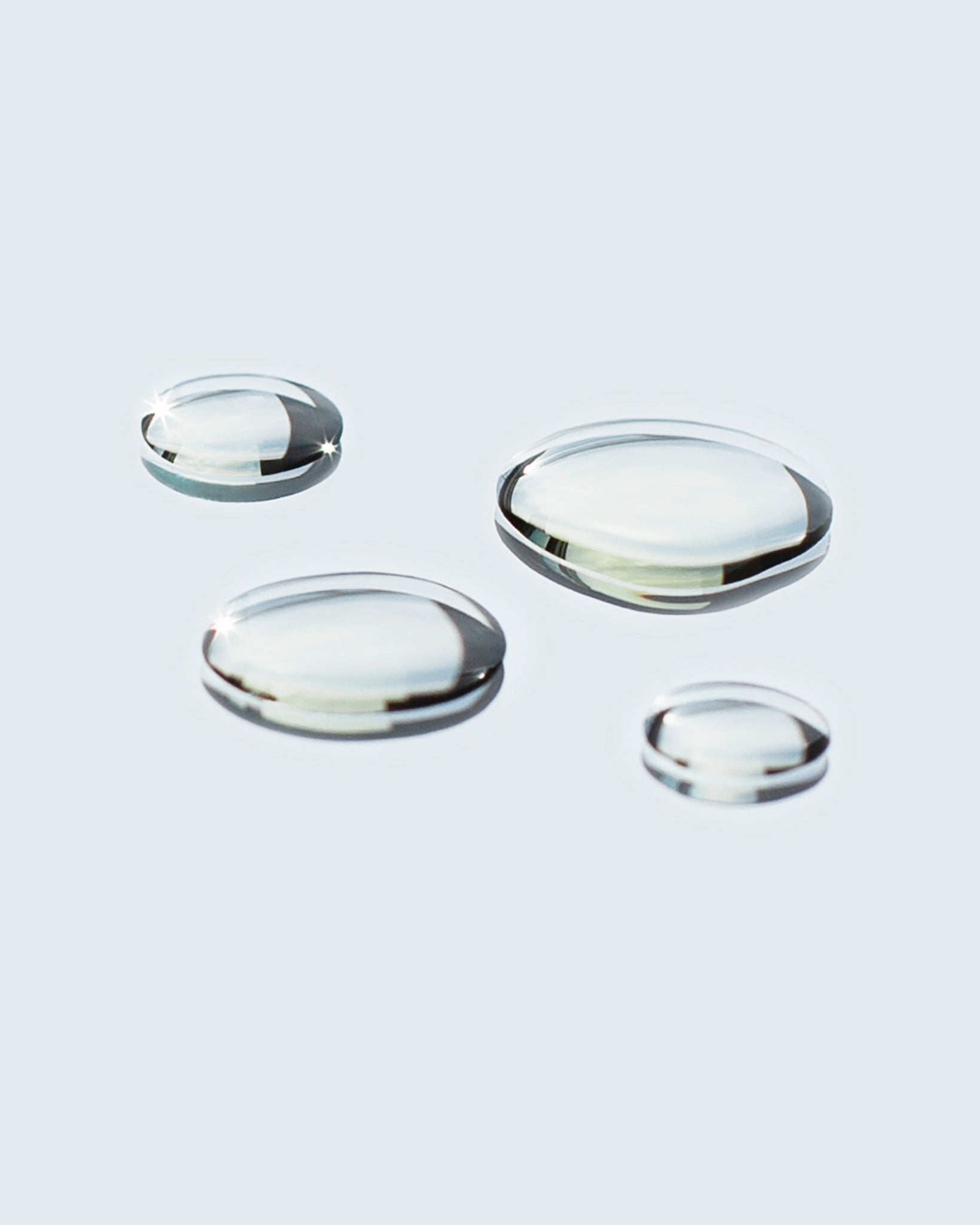 Model wearing MÁDARA Organic Skincare vitamin face oil A2281 face oil on skin; close-up portrait shows natural application results.