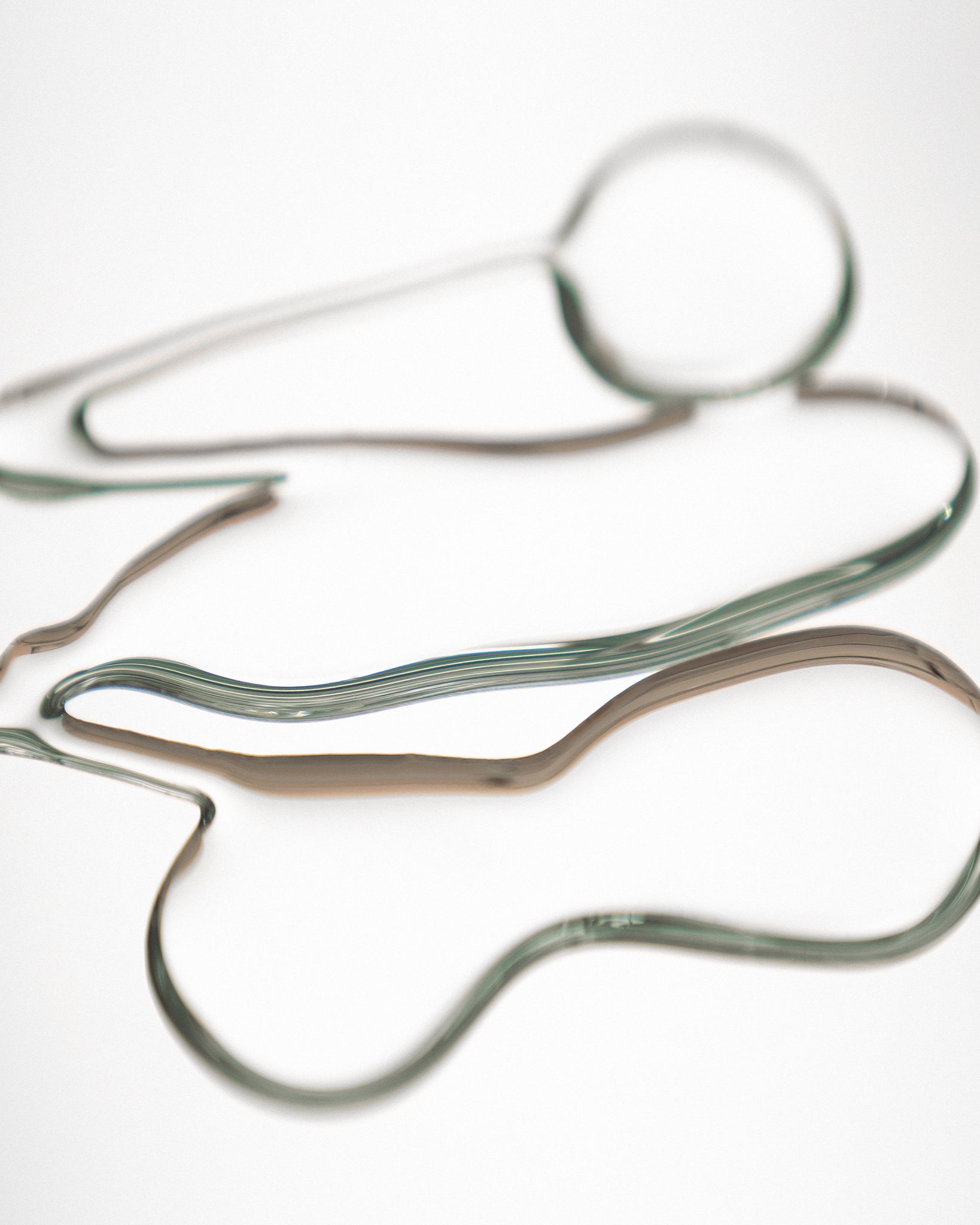 Texture close-up of MÁDARA Organic Skincare scalp peel serum A4074 serum �swatch demonstrates consistency and finish.