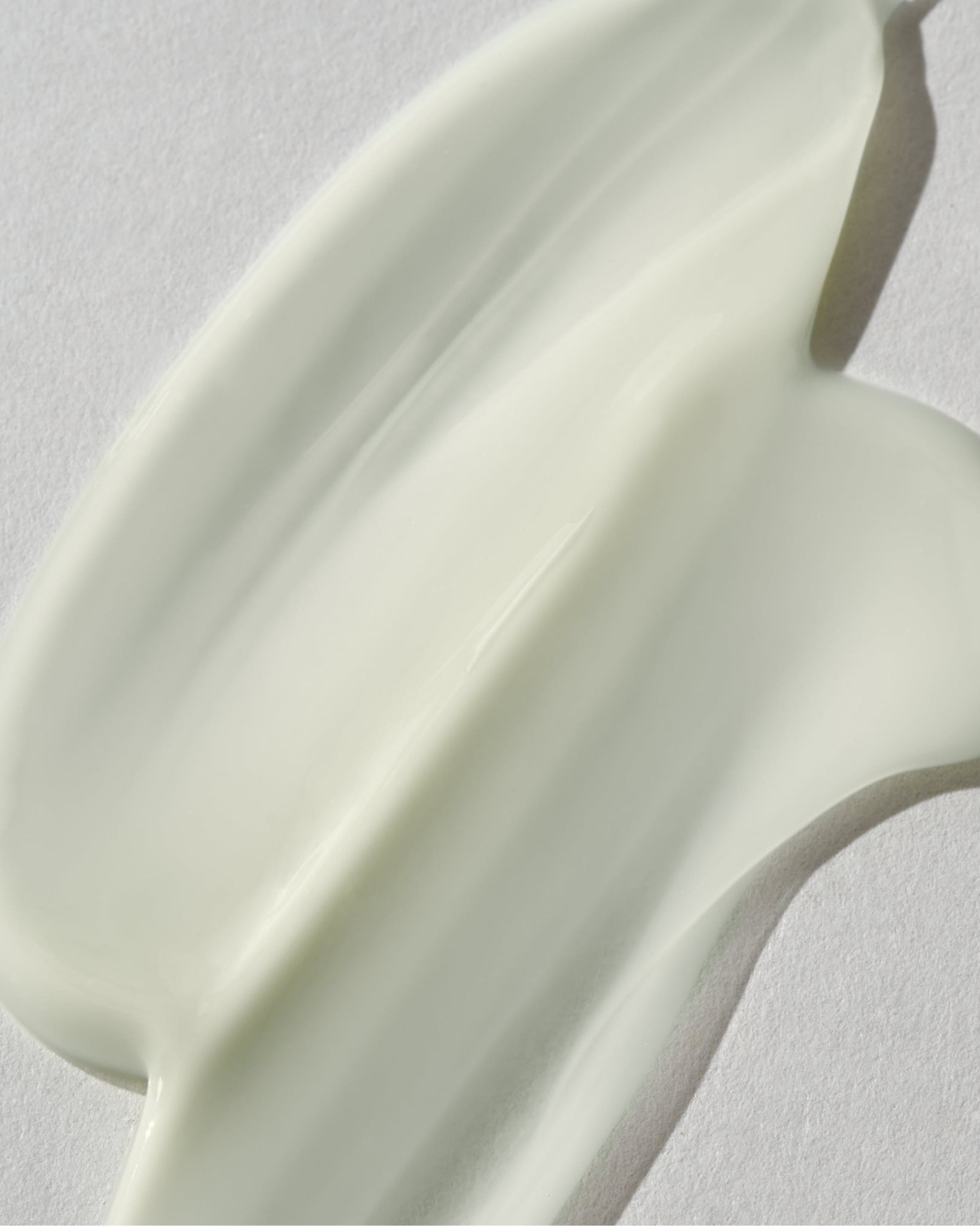 Model wearing MÁDARA Organic Skincare his men face cream A5003 face cream on skin; close-up portrait shows natural application results.