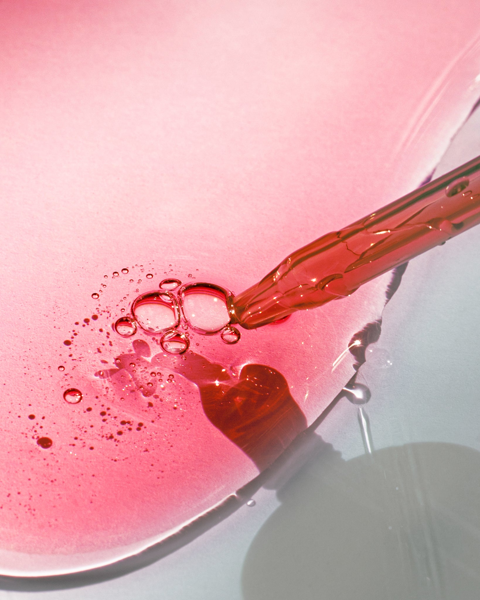 Texture close-up of MÁDARA Organic Skincare hyaluron intense peel serum A2104 serum �swatch demonstrates consistency and finish.