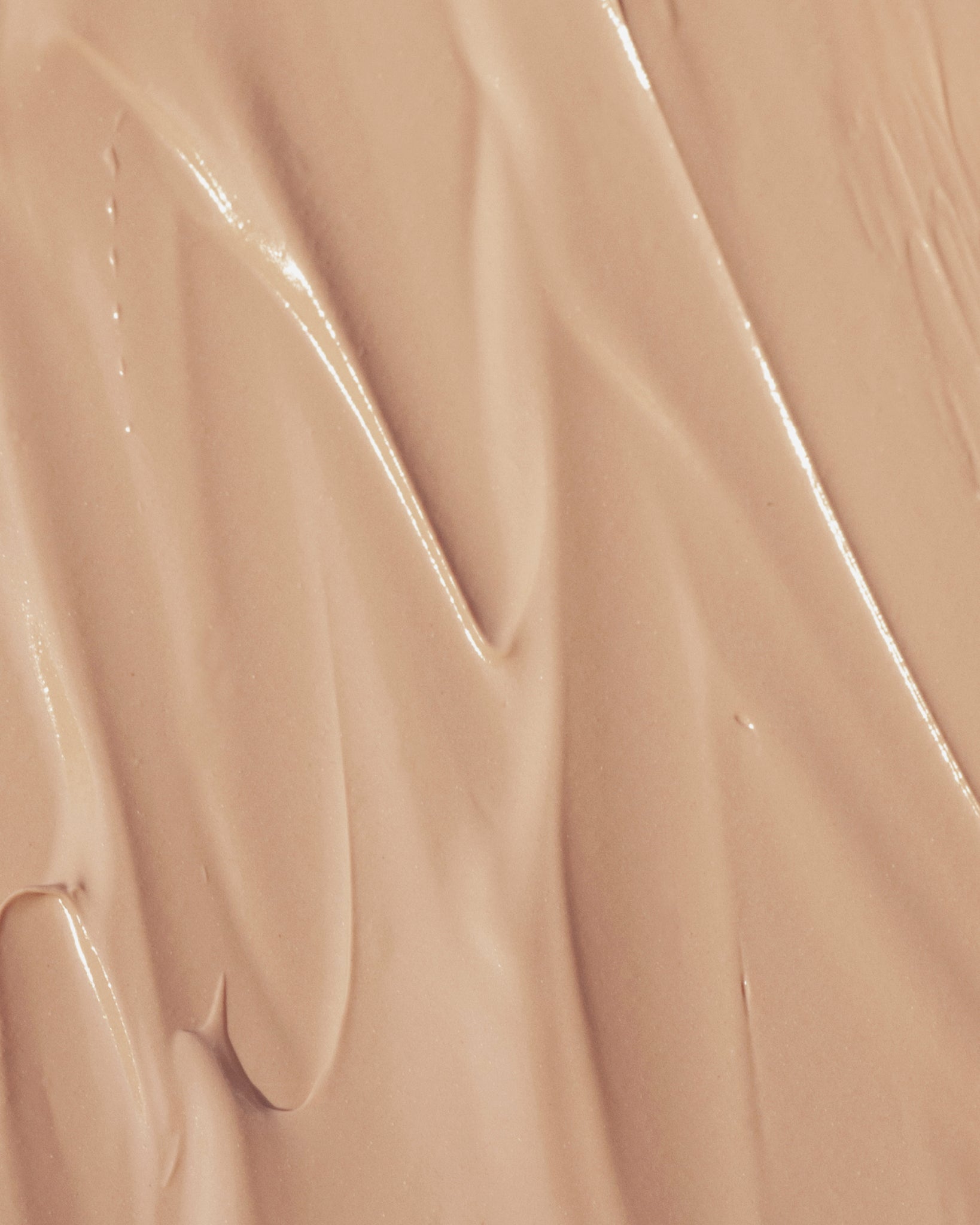 Texture close-up of MÁDARA Organic Skincare cc cream beige A3414 face cream �swatch demonstrates consistency and finish.