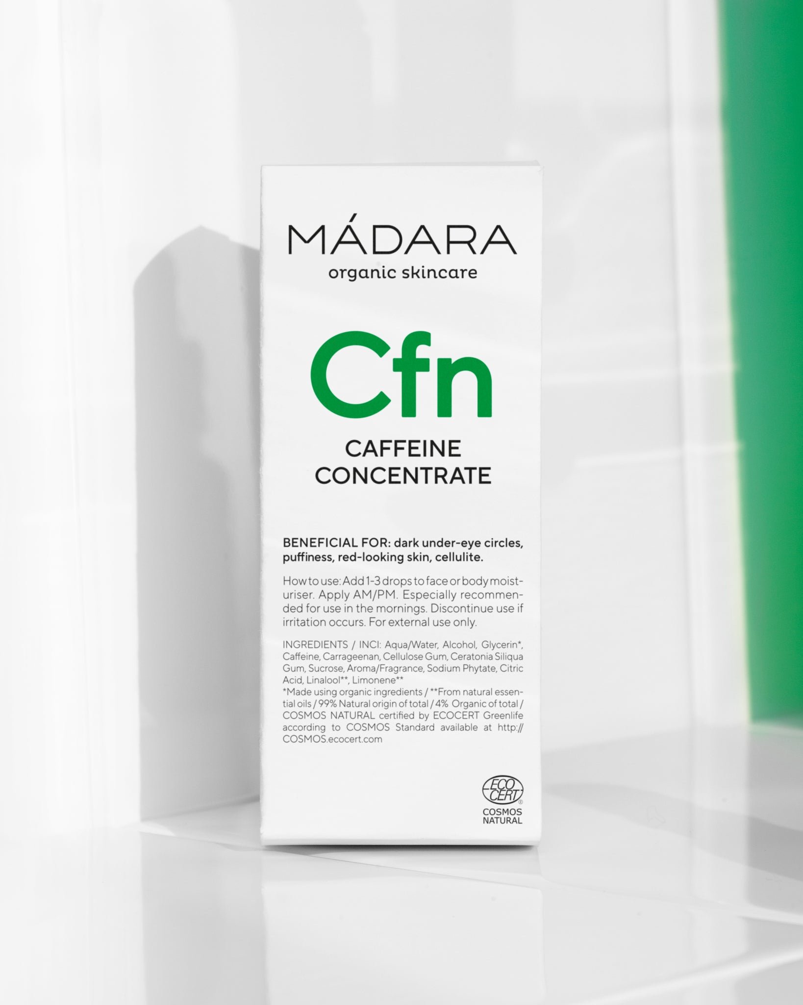 Texture close-up of MÁDARA Organic Skincare undereye caffeine drops A3255 �swatch demonstrates consistency and finish.