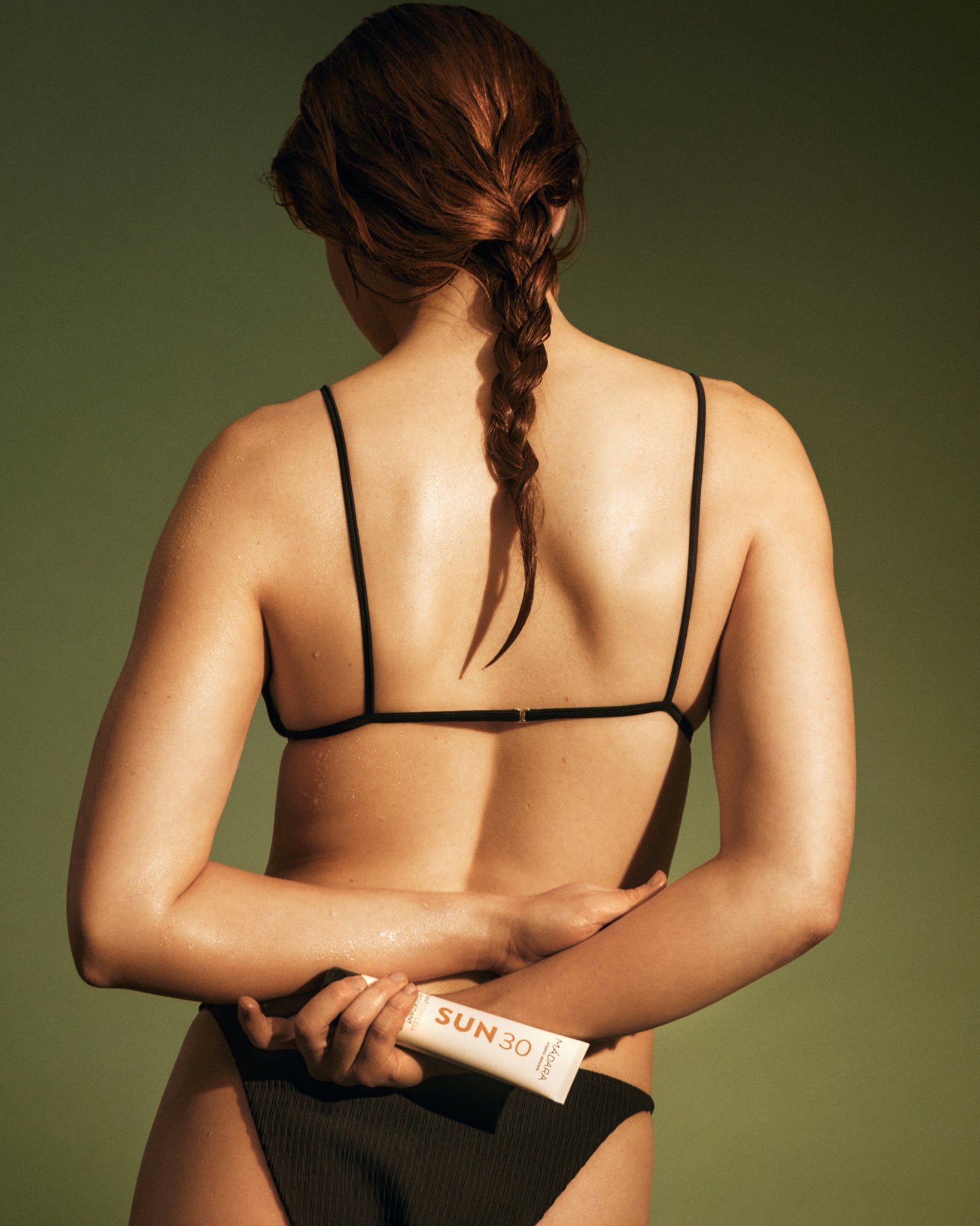 MÁDARA Organic Skincare spf for body A3401 mineral sunscreen product photo on plain background.