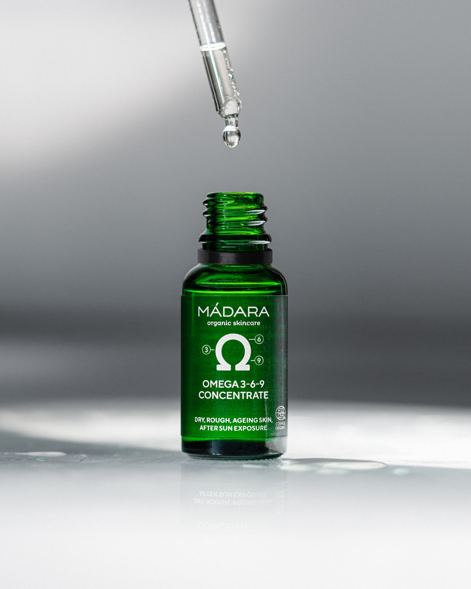 MÁDARA Organic Skincare omega serum A3263 serum product photo on plain background.